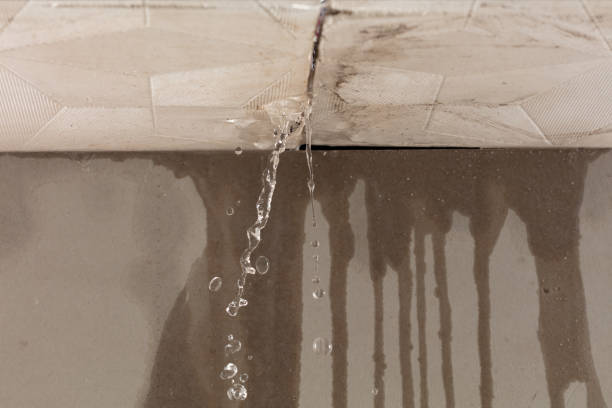 Professional Flood Damage Cleanup technician working in Kingston, NH